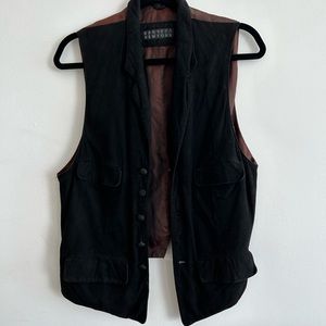 Barney’s black suede vest